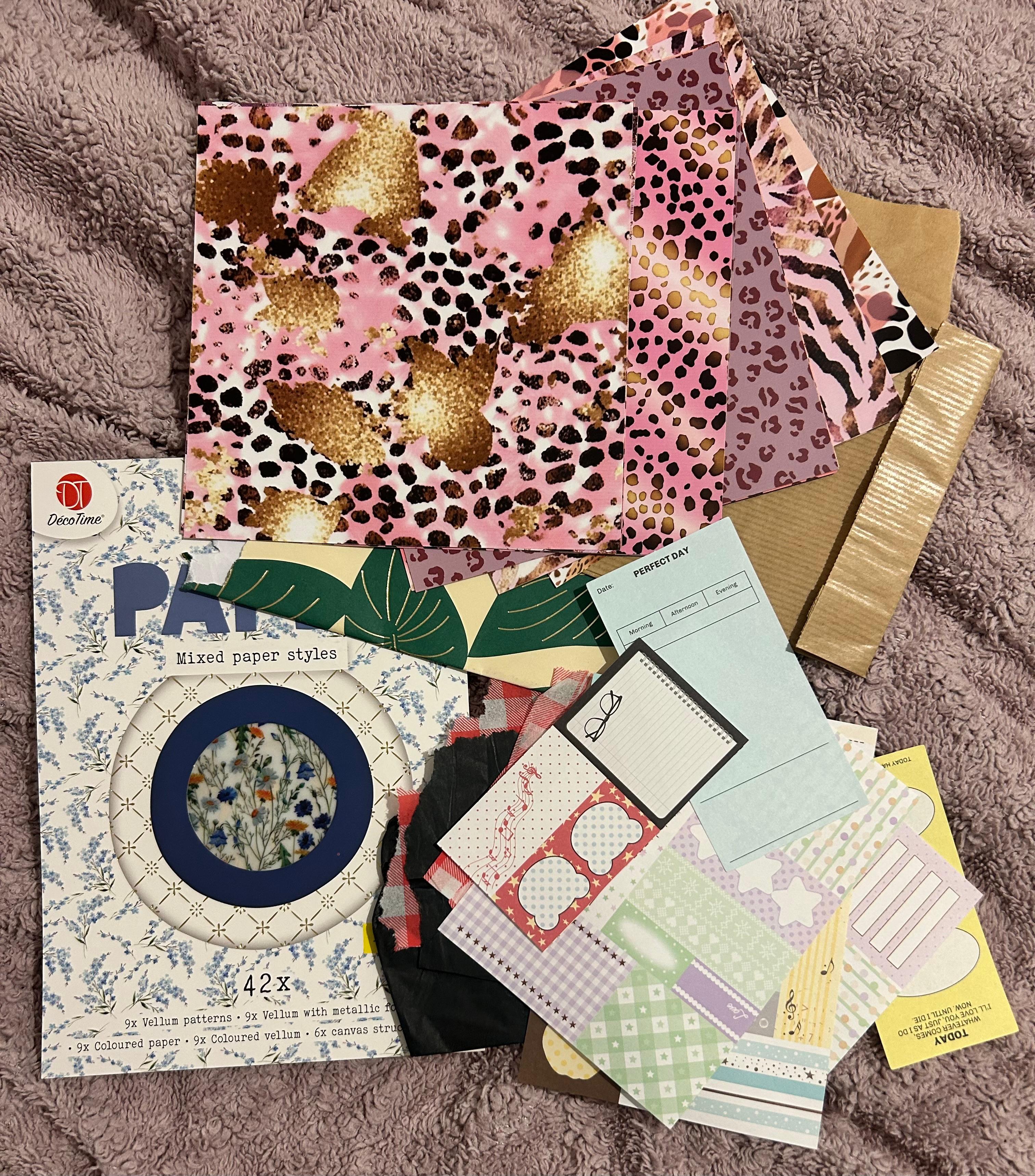 Various patterned papers and cutouts.